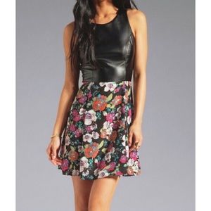 Vegan leather and floral fit and flare dress